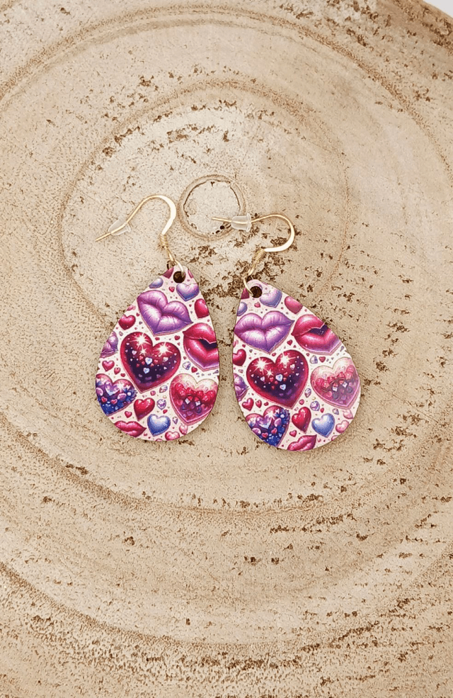 Boucle d'oreilles larme sublimée "cœur et bouche"