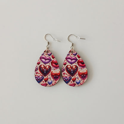 Boucle d'oreilles  larme"Bouche et cœur"