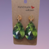 Boucle d'oreilles larmes avec image holographique verte